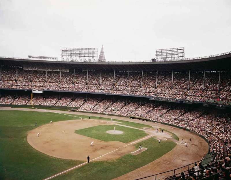 August 20, 1961 Cleveland Municipal Stadium. First game of a Cleveland Indian/NY Yankee doubleheader. Dick Stigman pitching in relief of Jim Perry to Roger Maris with Mickey Mantle on deck. Final score Yankees 6, Cleveland 0. In this game Mantle hit home run number 46 in the 1st inning and Maris hit number 49 in the 3rd. For more images visit www.ballparkprints.com
